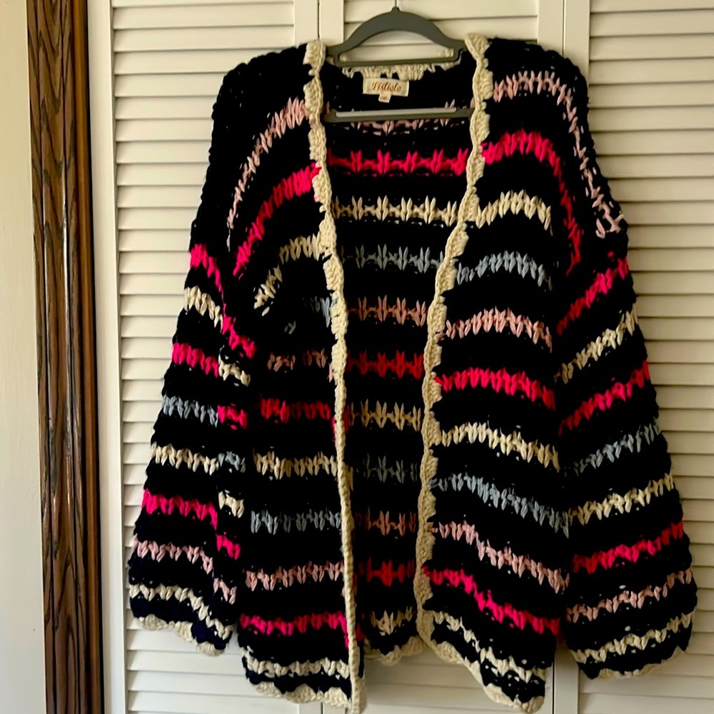 Multi color crochet cardigan. Bought at boutique. Never worn